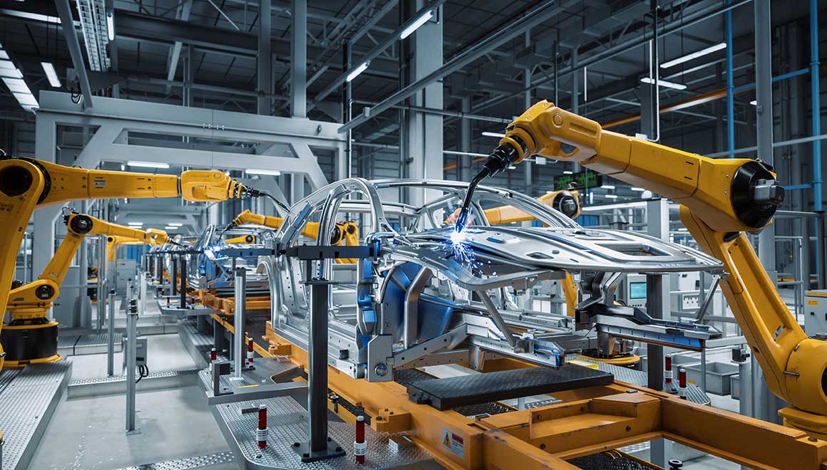 A car being built on an automated assembly line