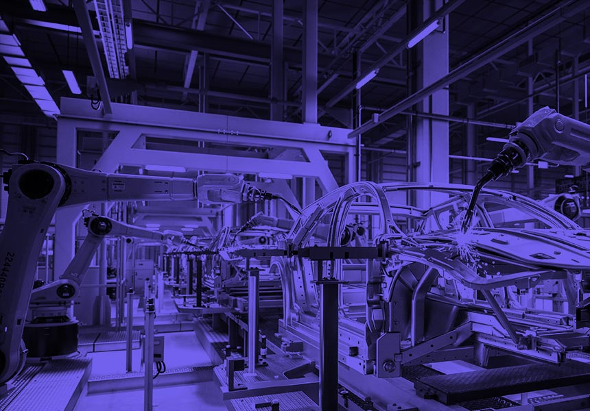 A car being built on an automated assembly line